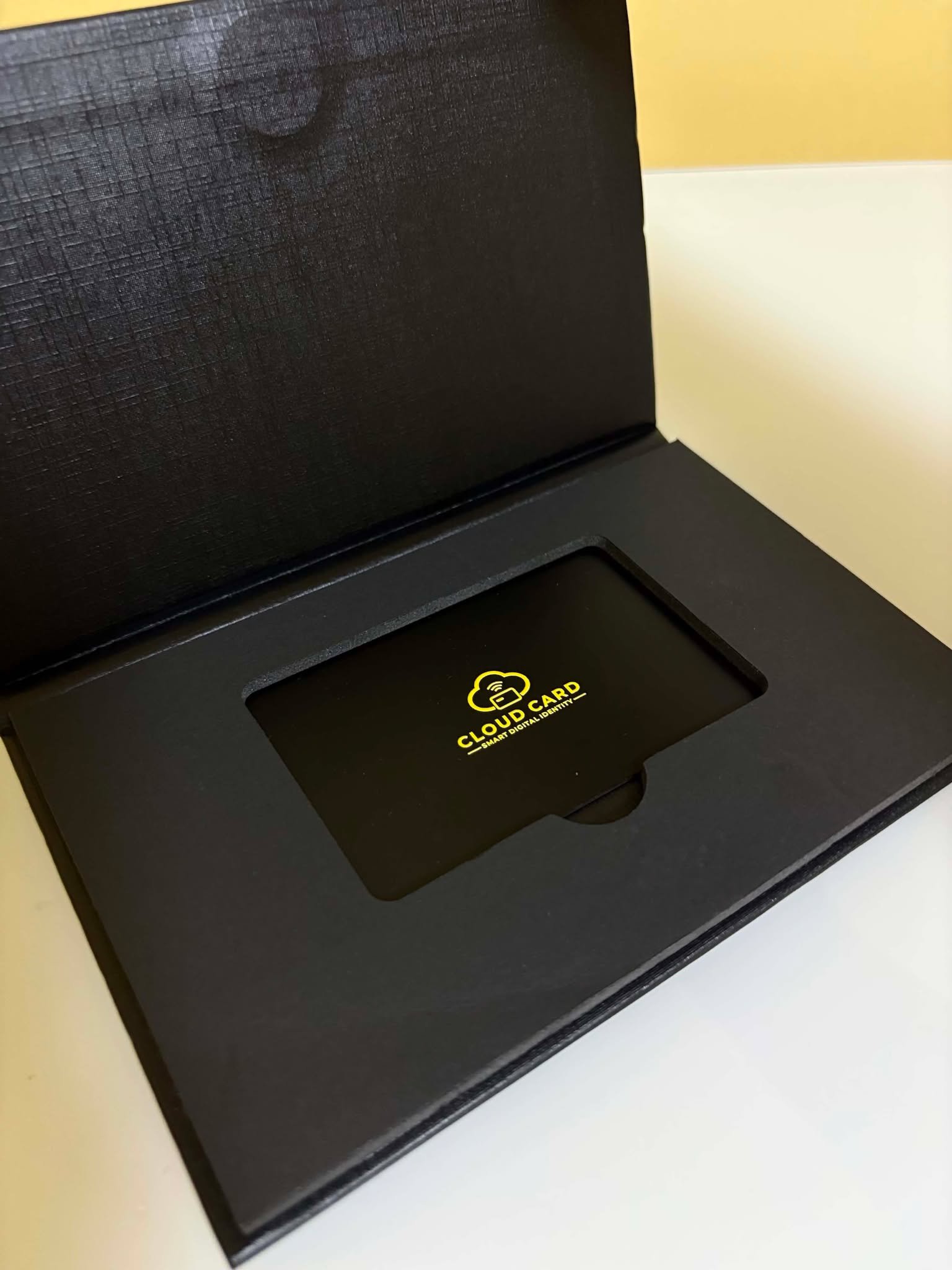 Authentic CloudCard package opened to show the black fitted card insert